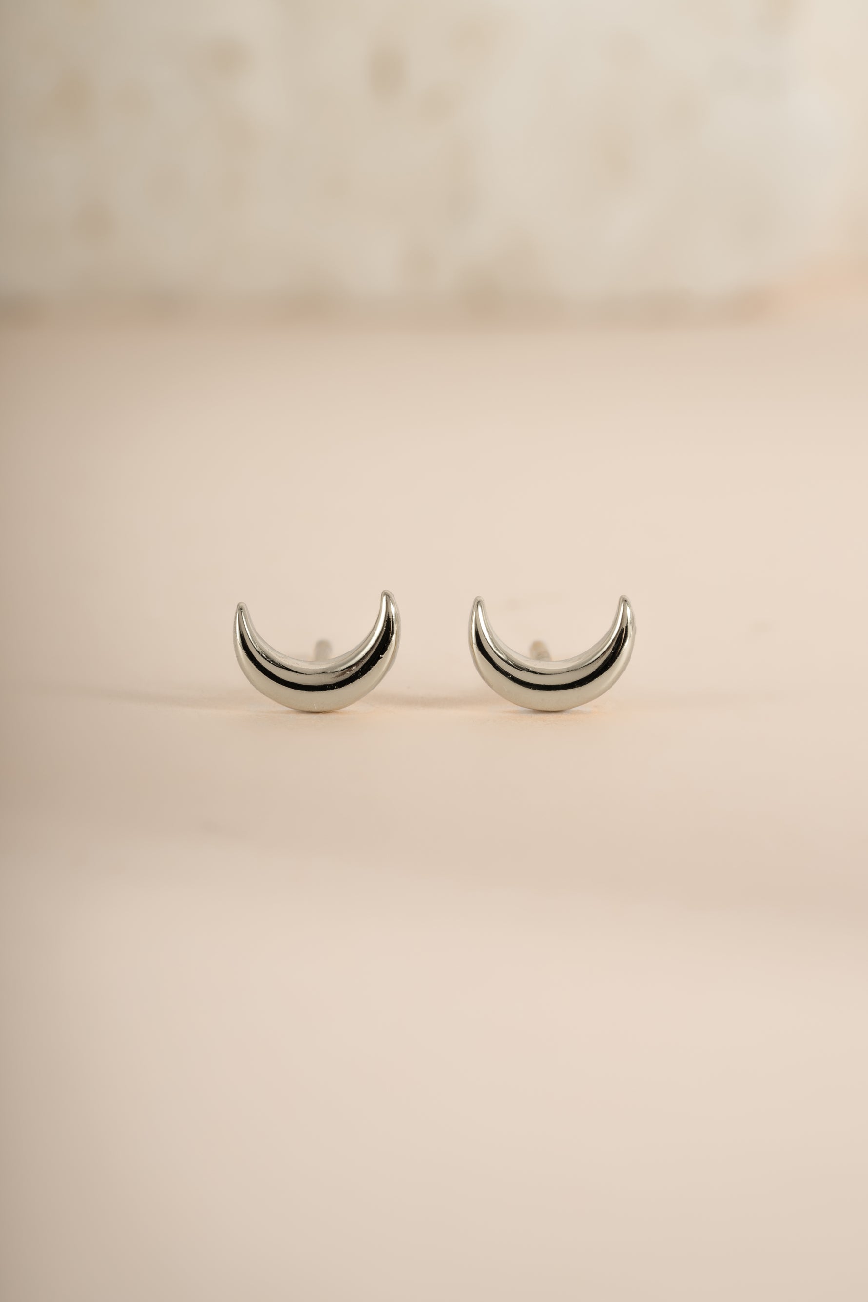 Sterling silver plain moon stud earrings by Sami Jewels featuring simple, minimalist moon-shaped jewelry for everyday wear.