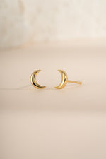 Gold plain moon stud earrings from Sami Jewels featuring simple, round moon-shaped design with a smooth finish.