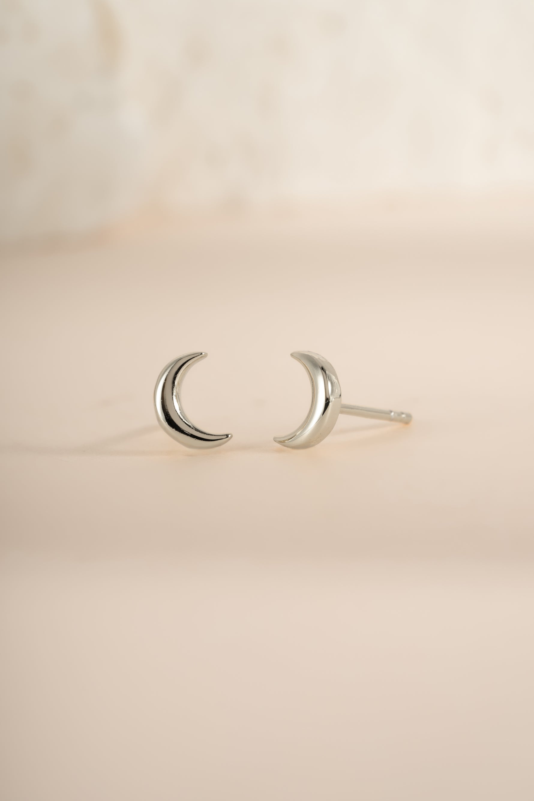 Sterling silver Plain Moon Stud Earrings by Sami Jewels, front view showing smooth, round moon-shaped studs.
