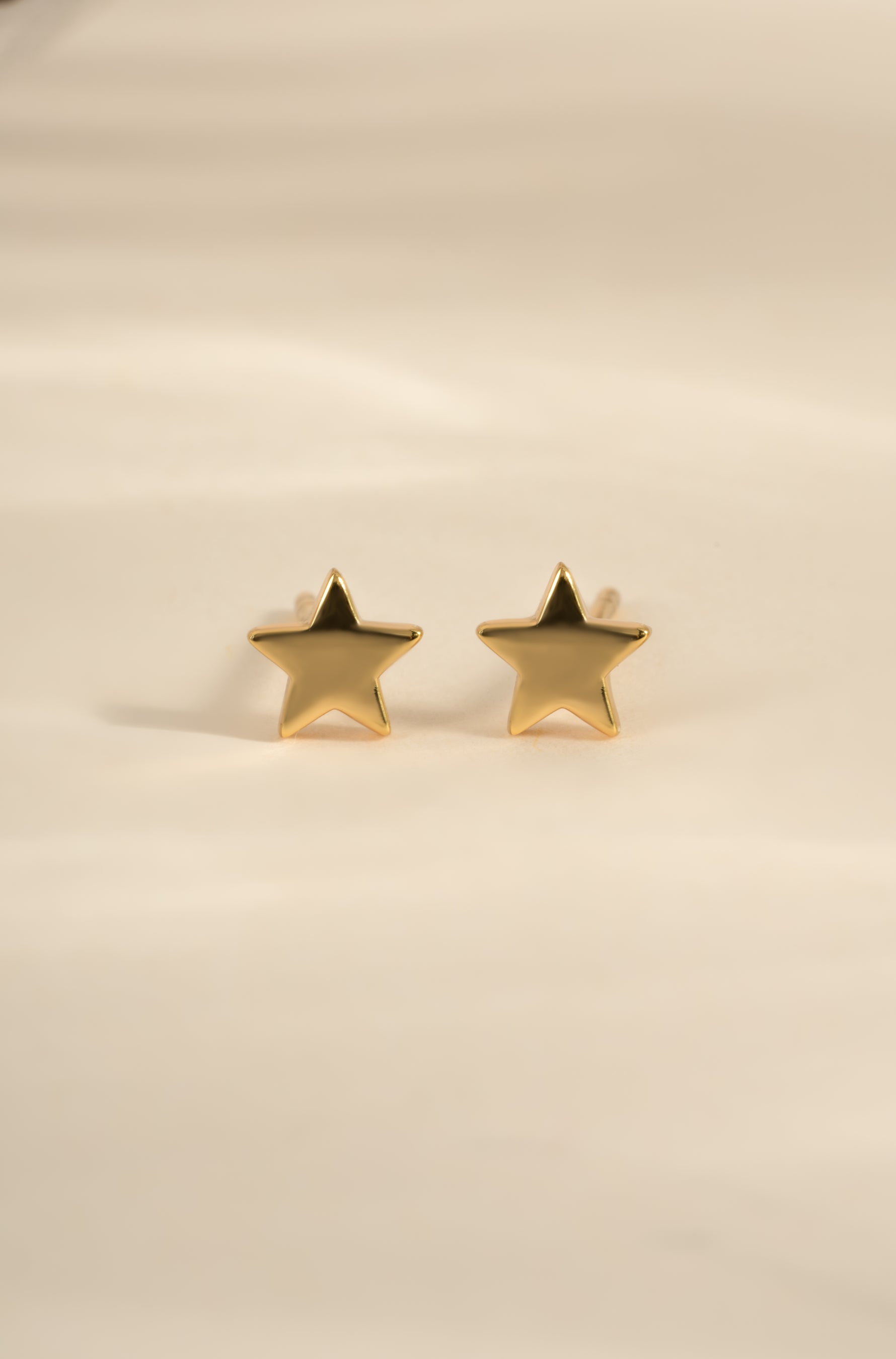 Gold plain star stud earrings by Sami Jewels, front view showing simple star-shaped earrings in a minimalist design.