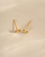 Gold plain star stud earrings from Sami Jewels, top view showing small, minimalist star design in shiny gold finish.