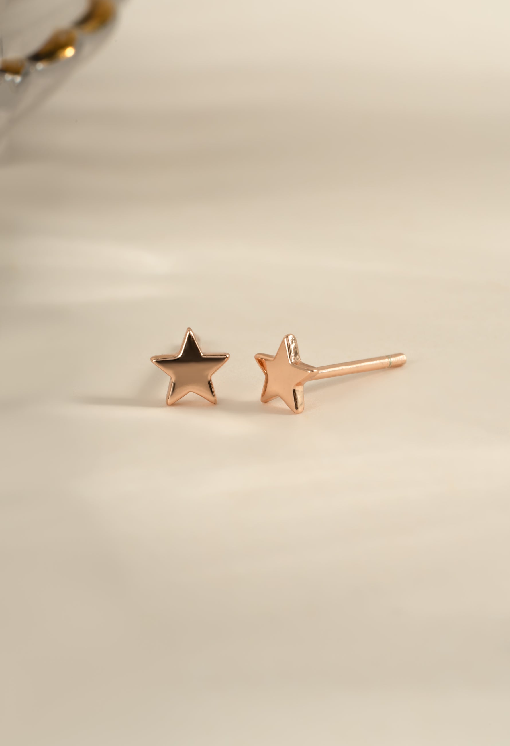 Rose gold plain star stud earrings from Sami Jewels featuring simple, minimalist star-shaped design.