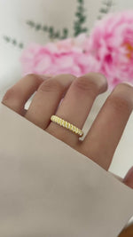textured stacking ring in gold on model video 
