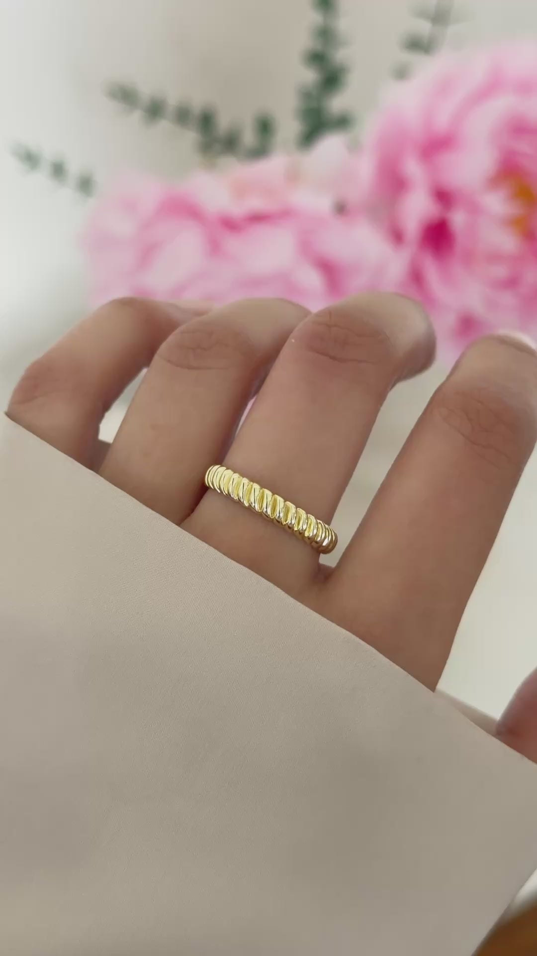 textured stacking ring in gold on model video 