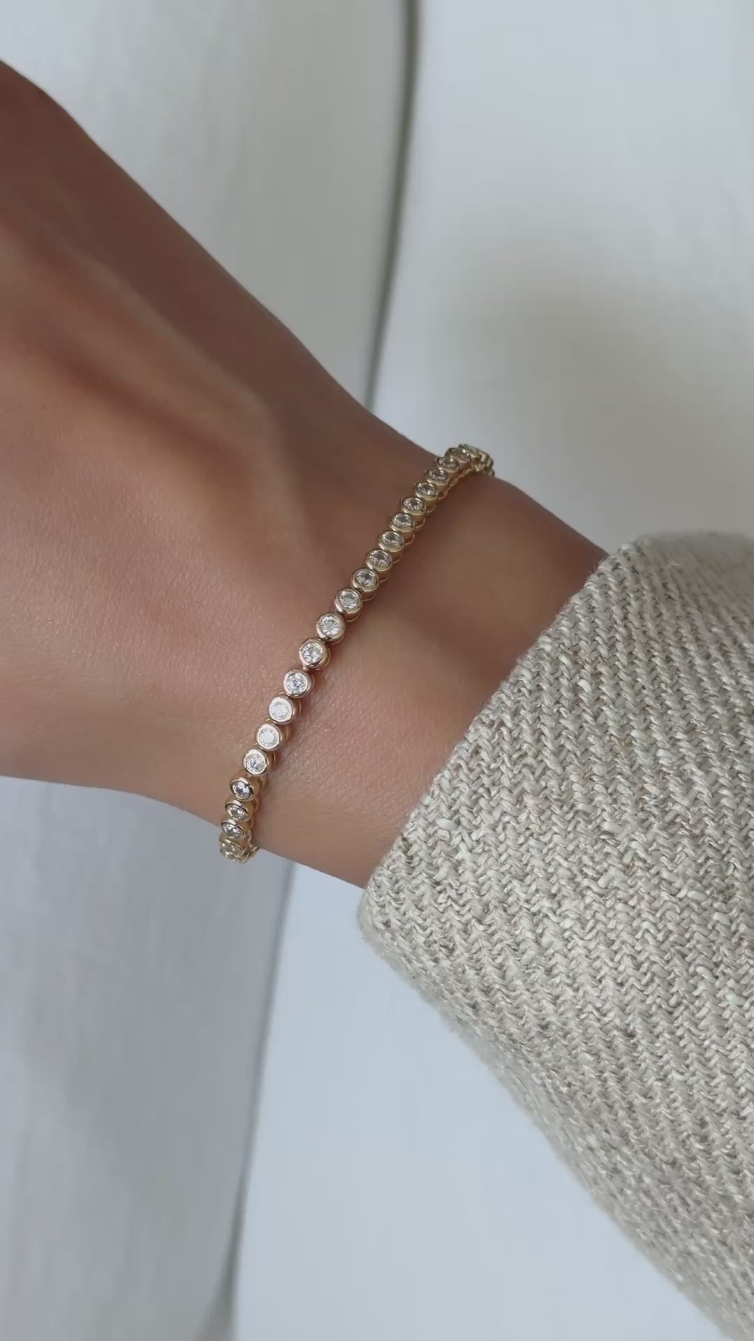 Video of the lab-grown diamond round bezel tennis bracelet in gold vermeil