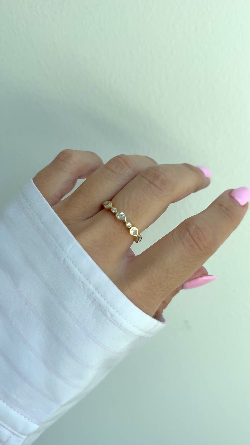 pear cut stacking ring in gold on model video 
