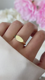 square signet ring in gold on models hand video 