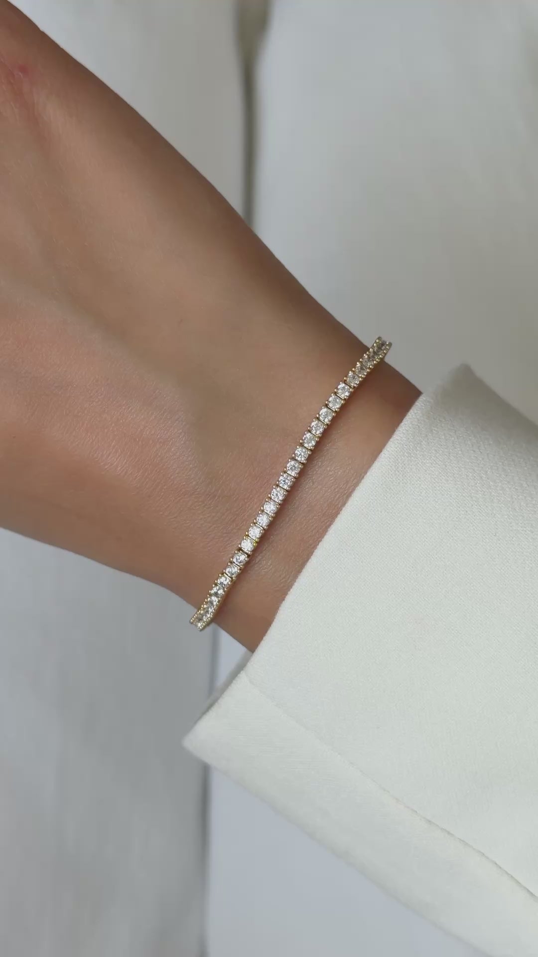 Video of the moissanite tennis bracelet in gold vermeil