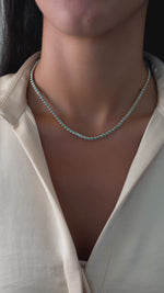 round turquoise tennis necklace in a 16inch length and 18inch length on model