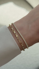 tennis and paperclip bracelet on model gold video