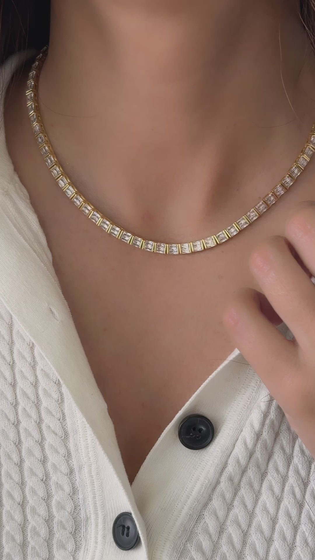 Video of model wearing baguette tennis necklace