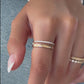 Video of model wearing plain and diamond line ring in gold with other dainty gold rings from Sami Jewels