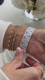 Handy Wrist Sizer, gently curving to wrap comfortably around the wrist for precise measurement.