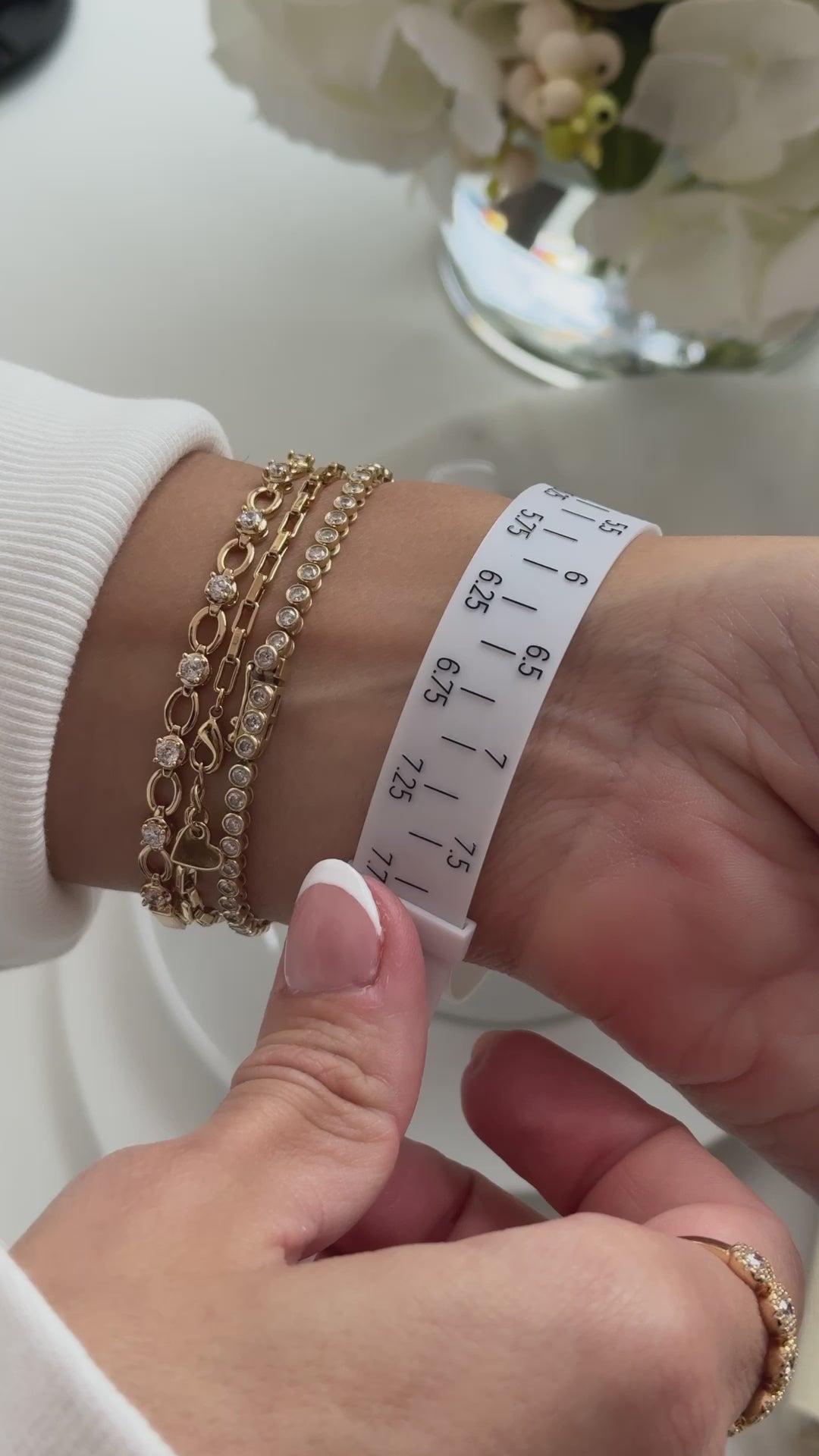 Handy Wrist Sizer, gently curving to wrap comfortably around the wrist for precise measurement.