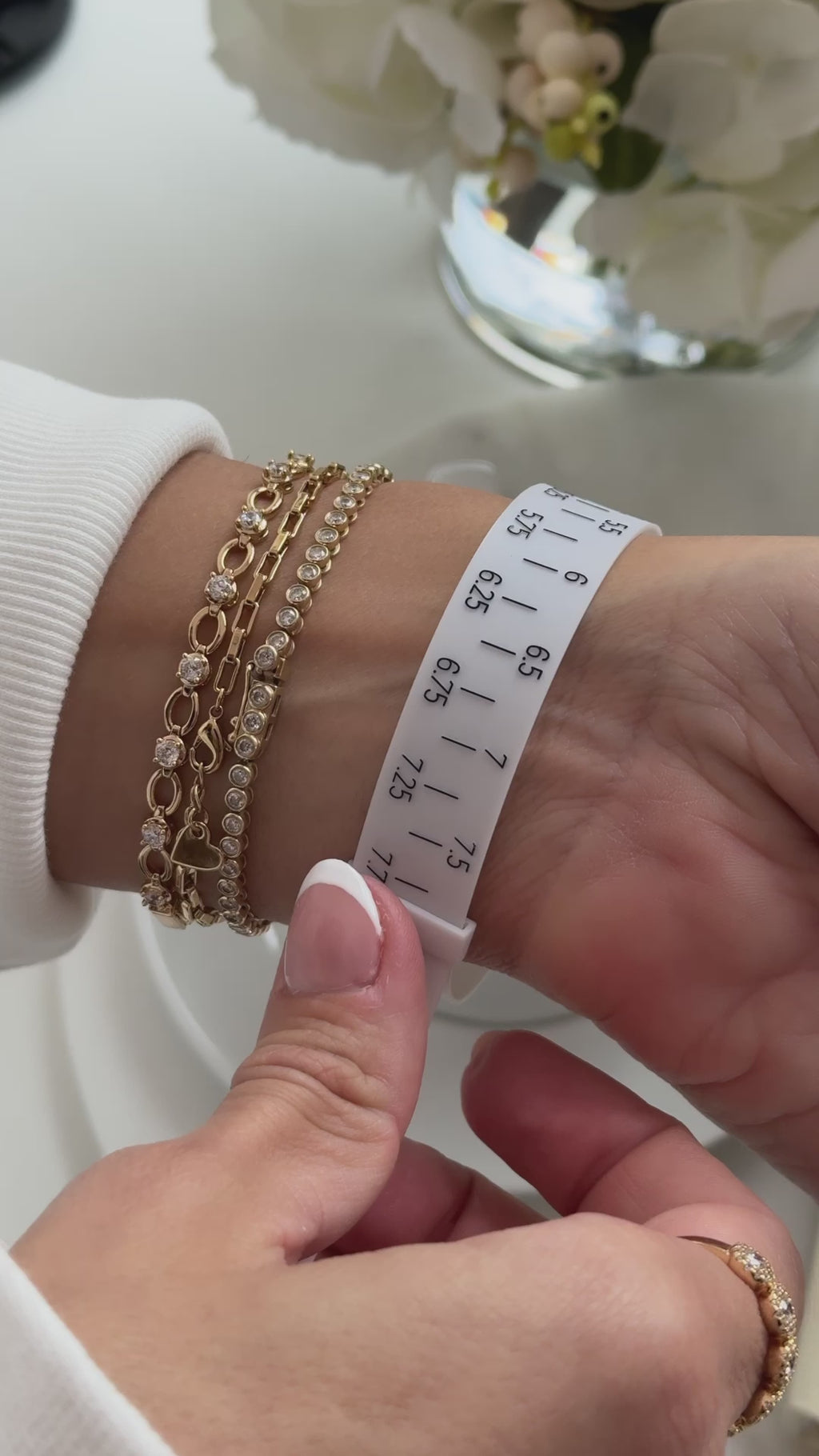 Handy Wrist Sizer, gently curving to wrap comfortably around the wrist for precise measurement.