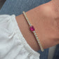 Tennis Bracelet with Ruby Baguette Charm