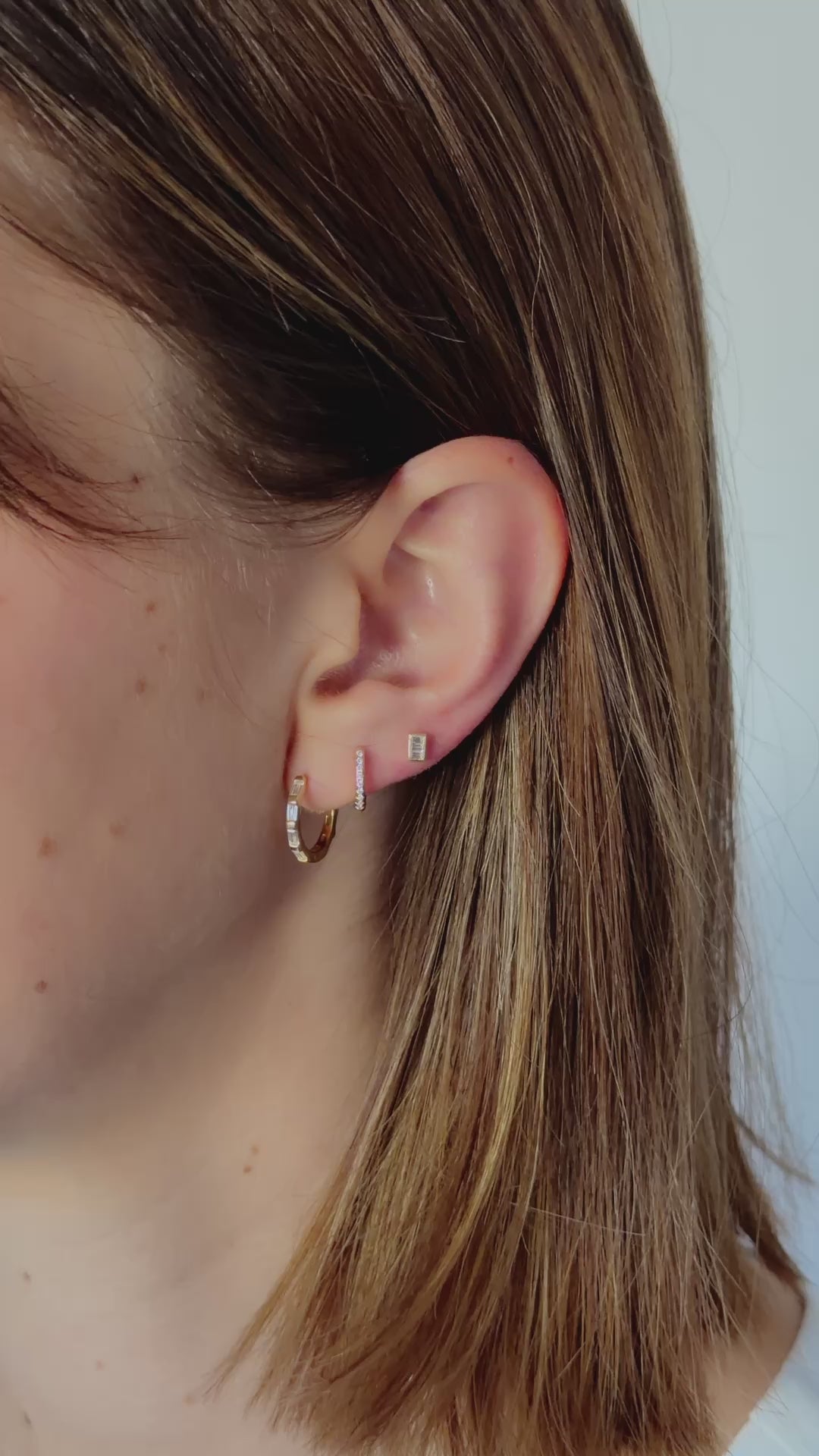 baguette hoop earrings styled in gold on model video 
