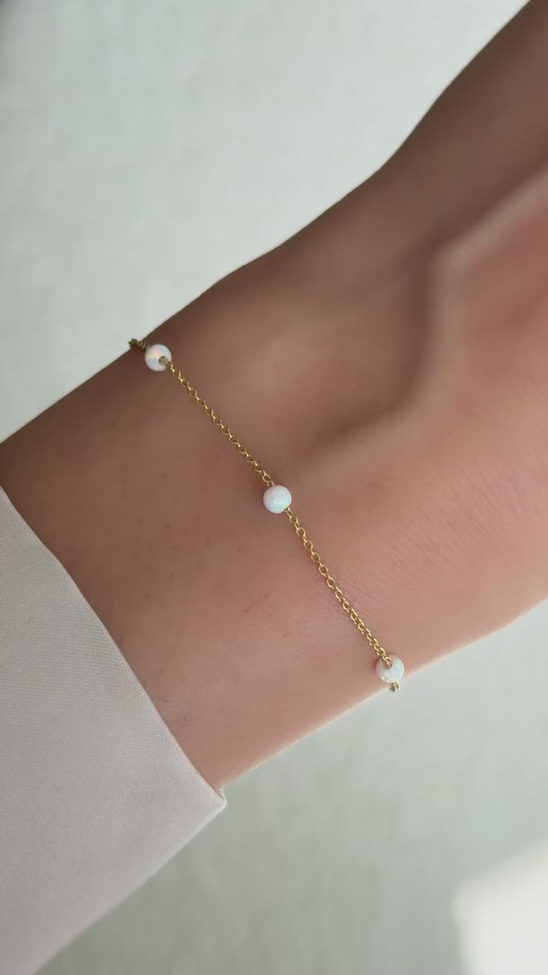 opal beaded bracelet in gold on model