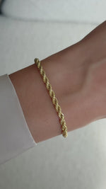 rope chain bracelet in gold on model video
