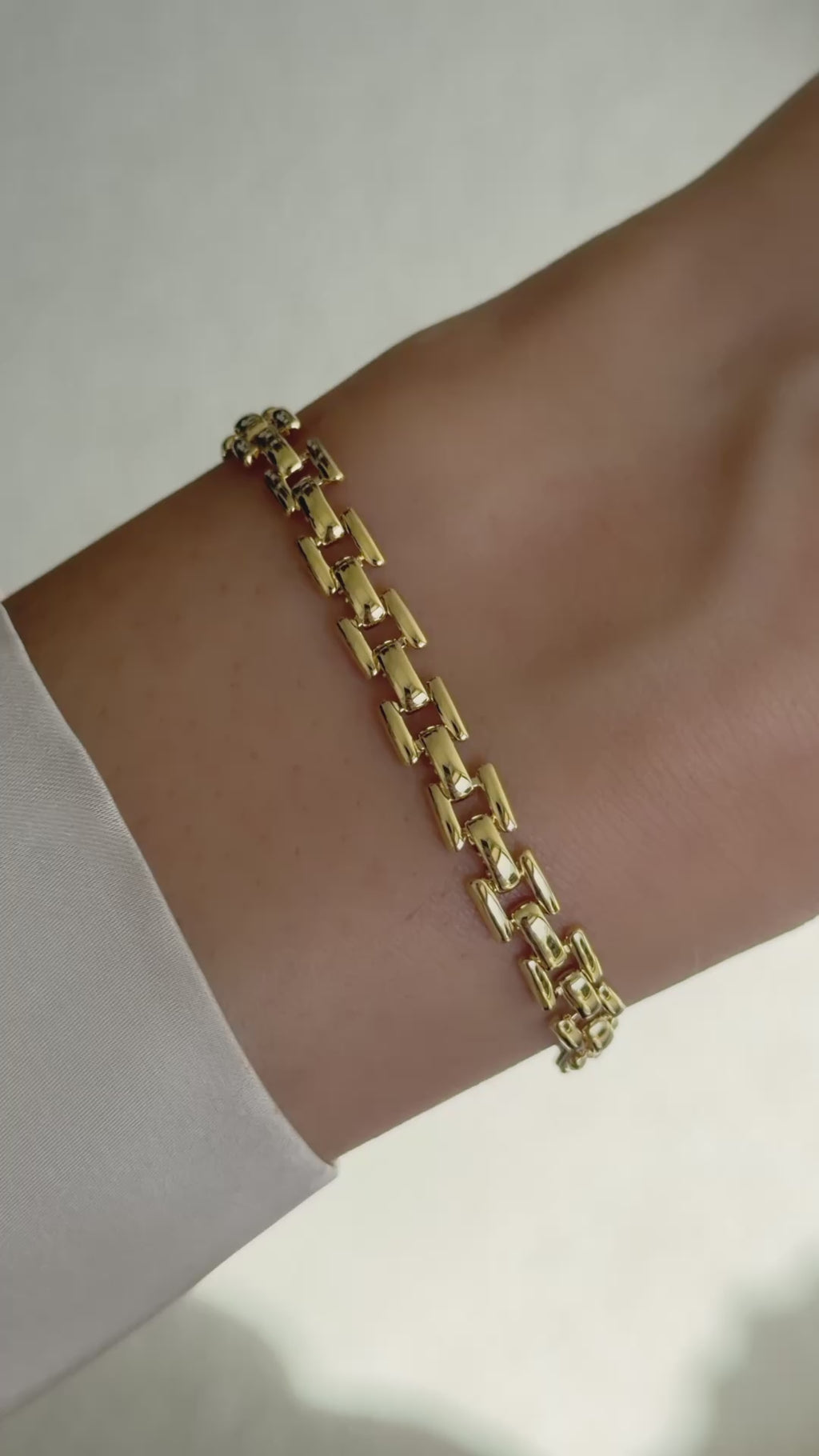 chain link bracelet in gold on model video 