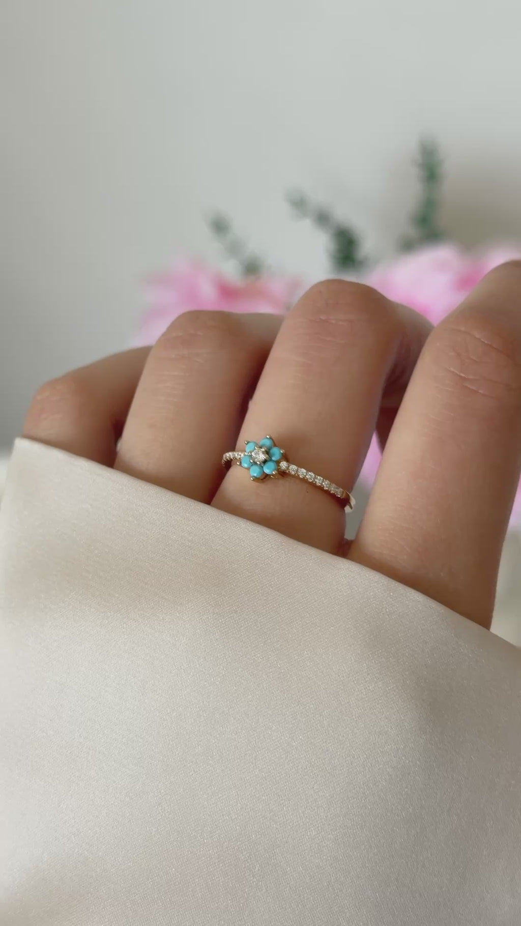 turquoise flower ring in gold on model video