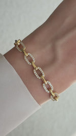 pave chain link bracelet in gold on model