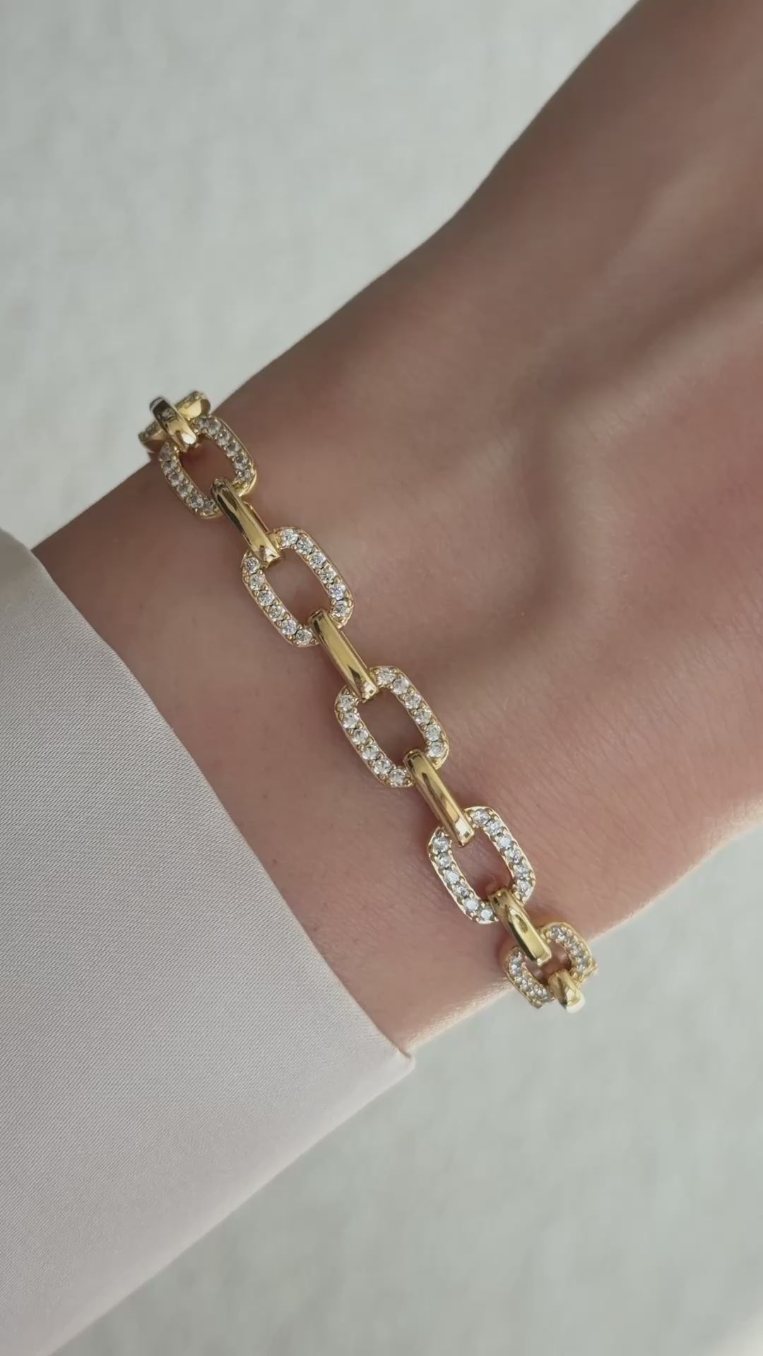 pave chain link bracelet in gold on model