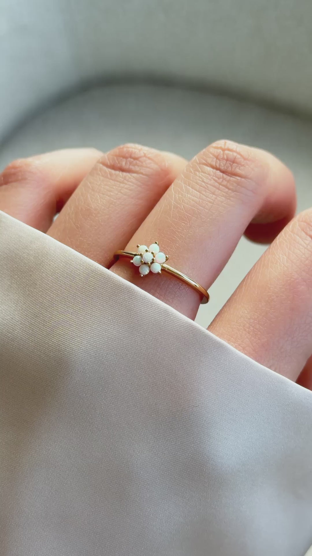 opal flower ring in gold on model 
