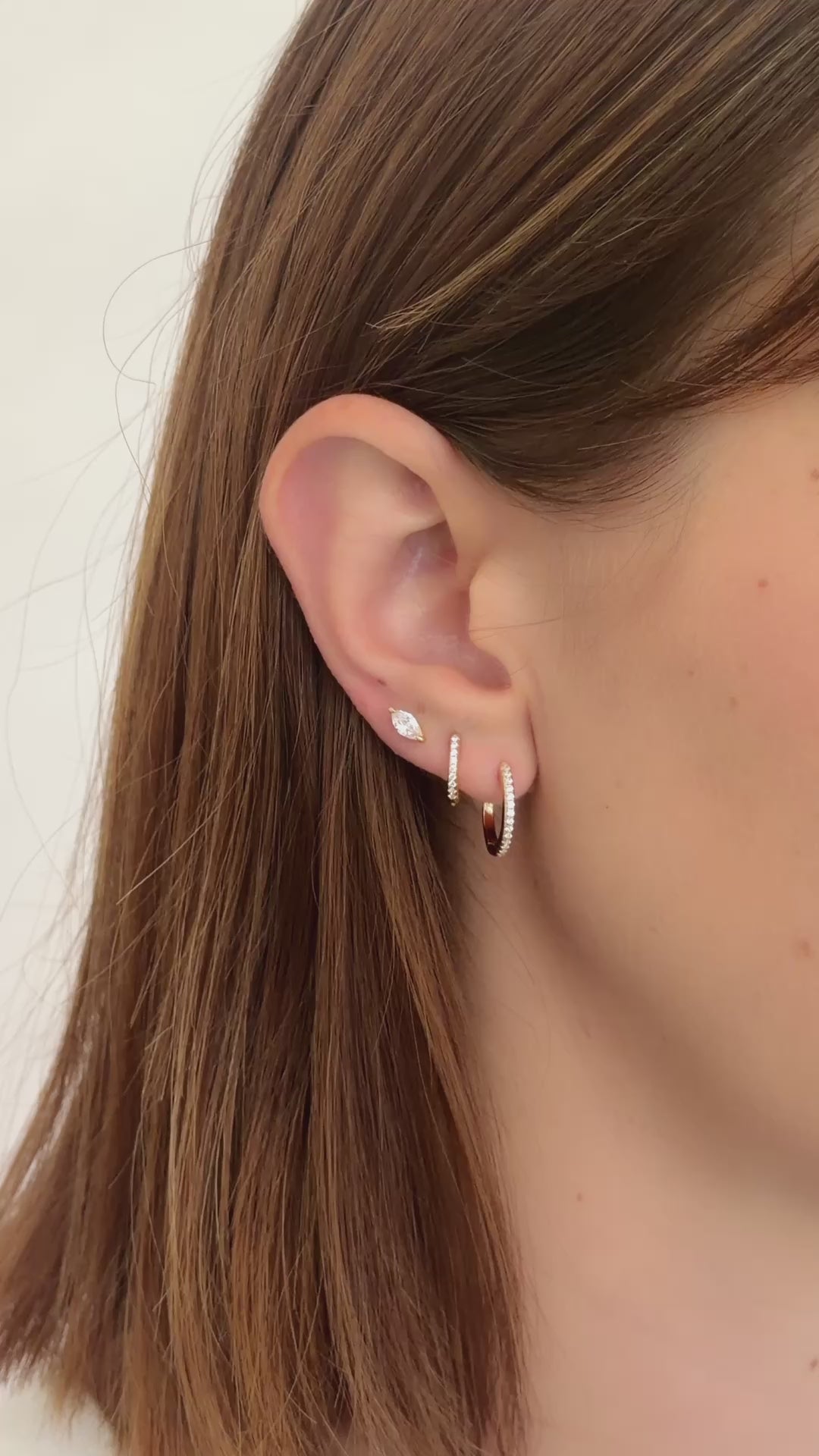 pave diamond huggie hoops in gold model video