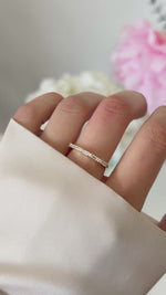 baguette diamond stacking ring in gold on model video 