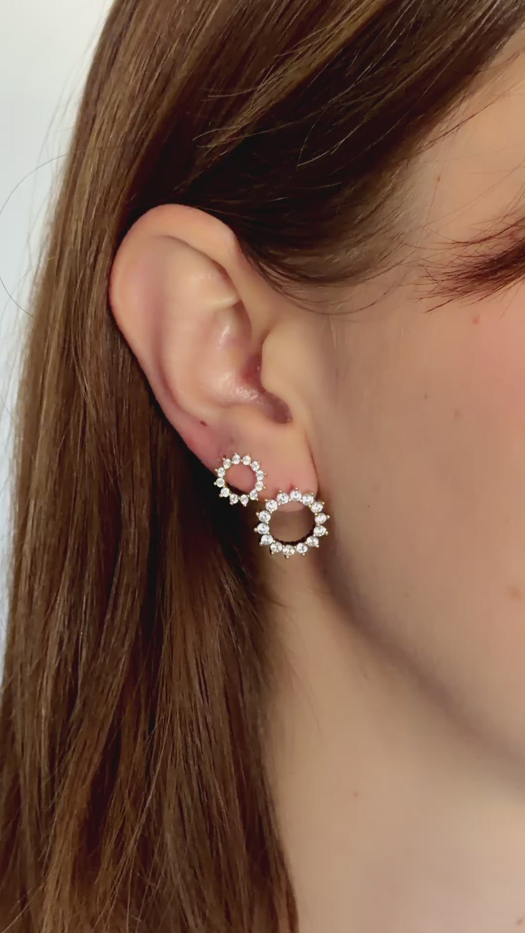 sunburst diamond stud earrings in gold on model video 