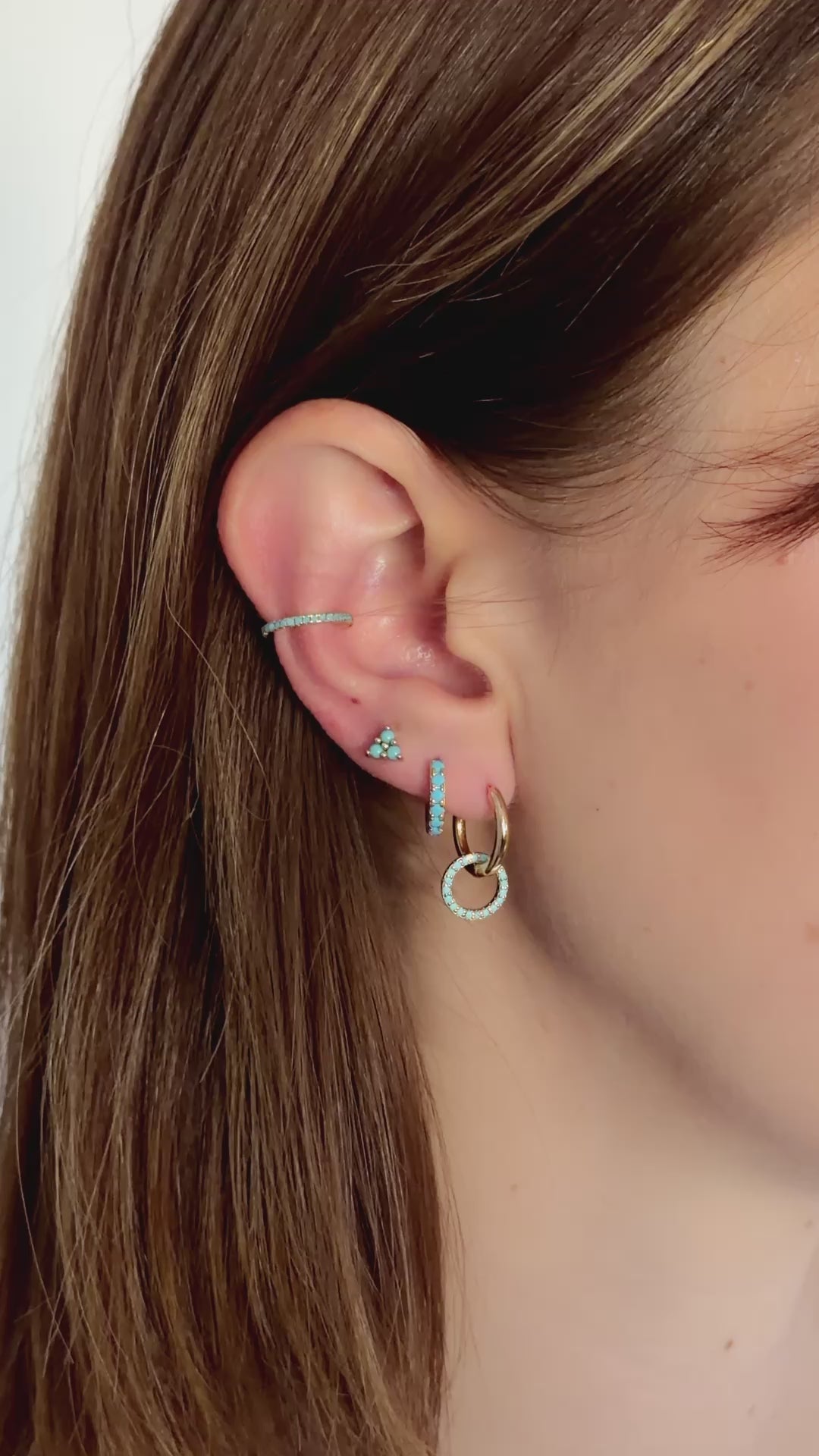 turquoise three stone stud earring stack in  gold on model video