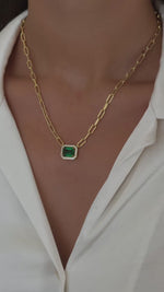 paperclip emerald pendant necklace in gold on model