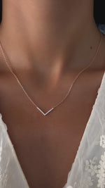 Chevron Necklace in rose gold on model 