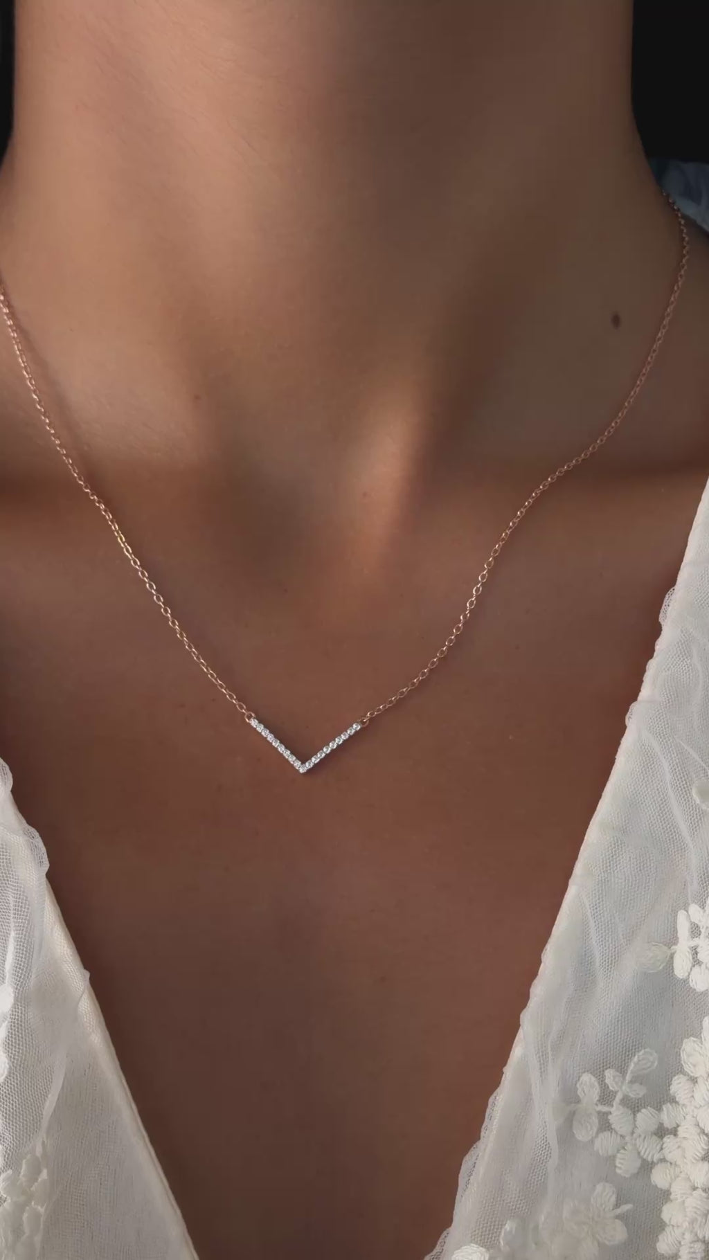 Chevron Necklace in rose gold on model 