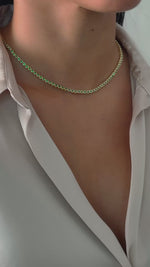 Video of round emerald tennis necklace