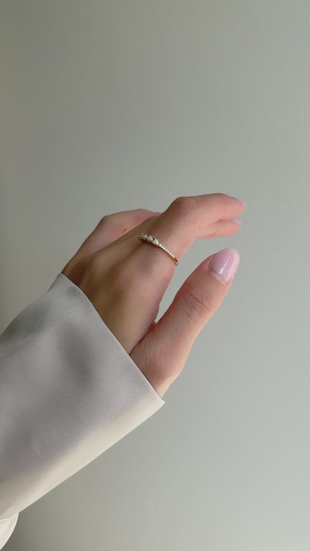 five stone opal ring in gold on model video