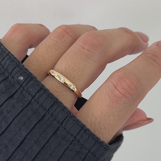 Video of model wearing thin starburst ring in gold from Sami Jewels