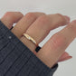 Video of model wearing thin starburst ring in gold from Sami Jewels