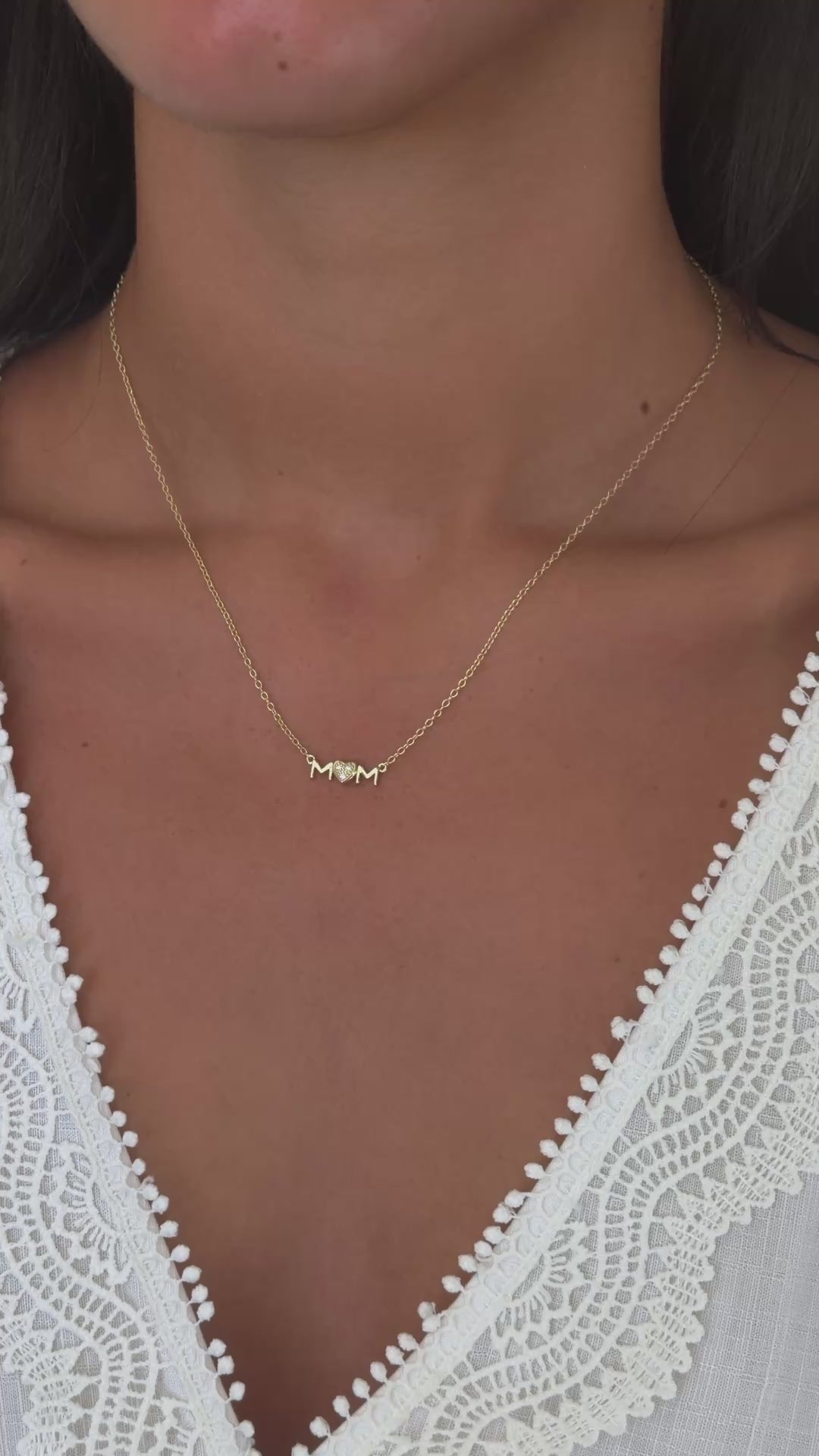 mom heart pendant necklace in gold on model video