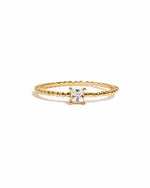 Gold princess cut ring with a beaded band from Sami Jewels displayed on a white background.