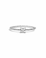 Sterling silver princess cut ring with beaded band from Sami Jewels on a white background.