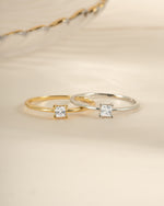 Dainty princess cut ring by Sami Jewels featuring a gold and sterling silver design, showcasing a sparkling princess-cut gemstone.