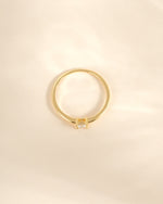Gold princess cut dainty ring from Sami Jewels, top view showing a sleek, elegant design perfect for everyday wear.
