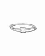 Sterling silver princess cut dainty ring from Sami Jewels with a sparkling square gemstone on a white background.