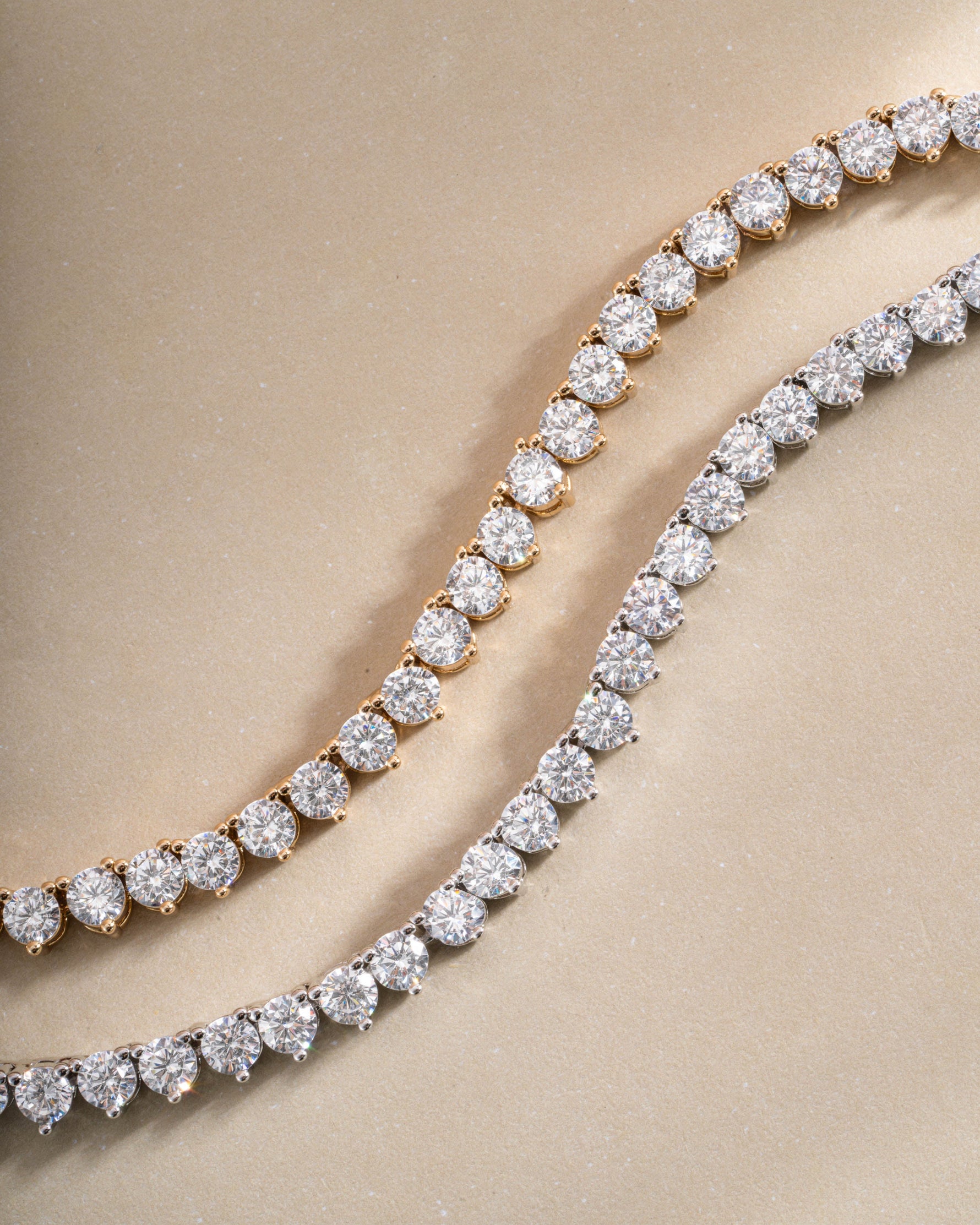 Sami Jewels Stella Tennis Necklace with prong-set diamonds in gold and silver, elegant jewelry piece with sparkling gemstones.