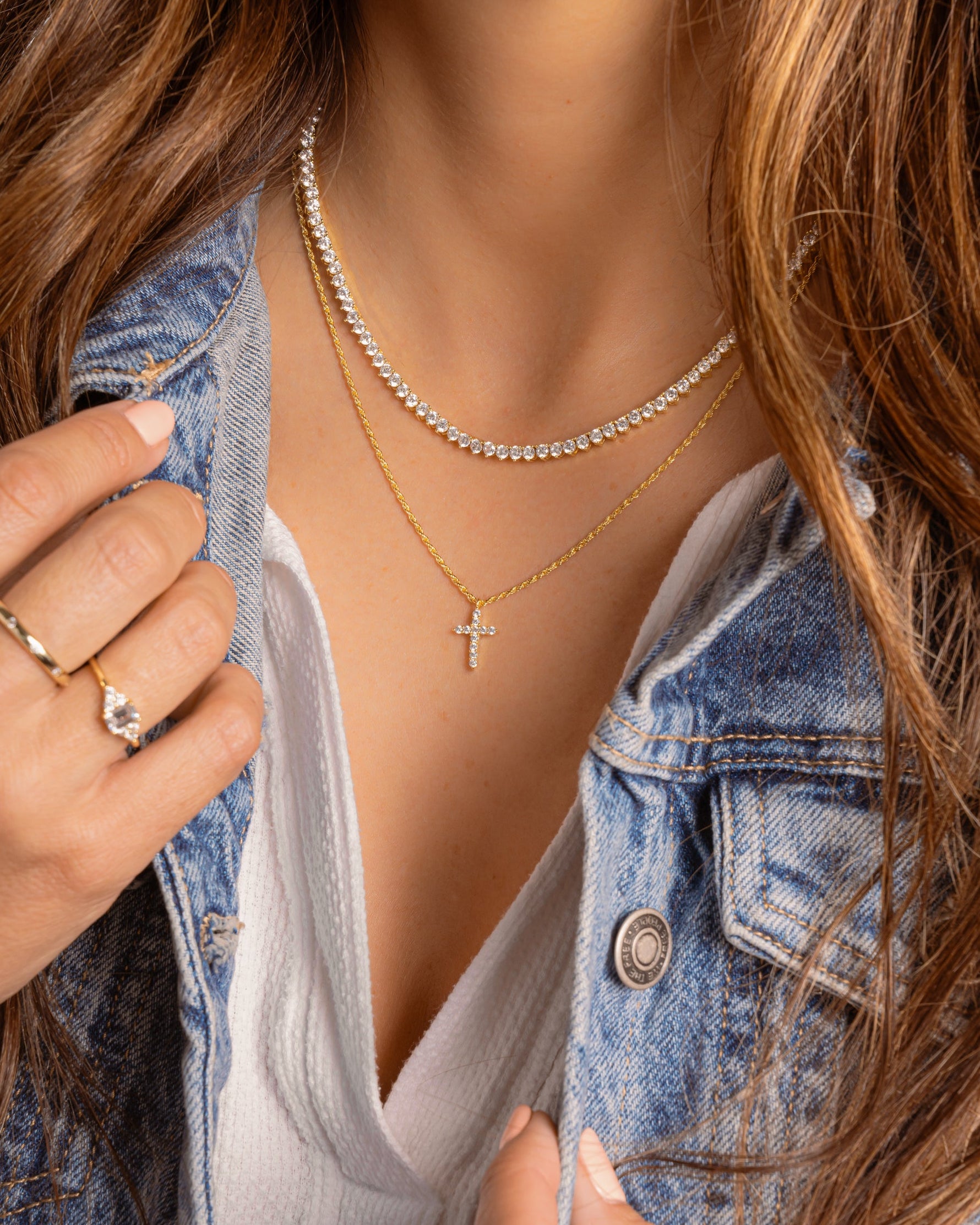 Gold Stella Tennis Necklace by Sami Jewels featuring a prong-set diamond tennis chain on a model.