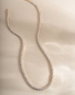 Gold Stella Tennis Necklace by Sami Jewels featuring a prong-set diamond tennis chain for elegant style.