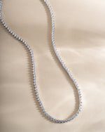 Silver Stella Tennis Necklace by Sami Jewels featuring a row of sparkling prong-set diamonds on a sleek chain.