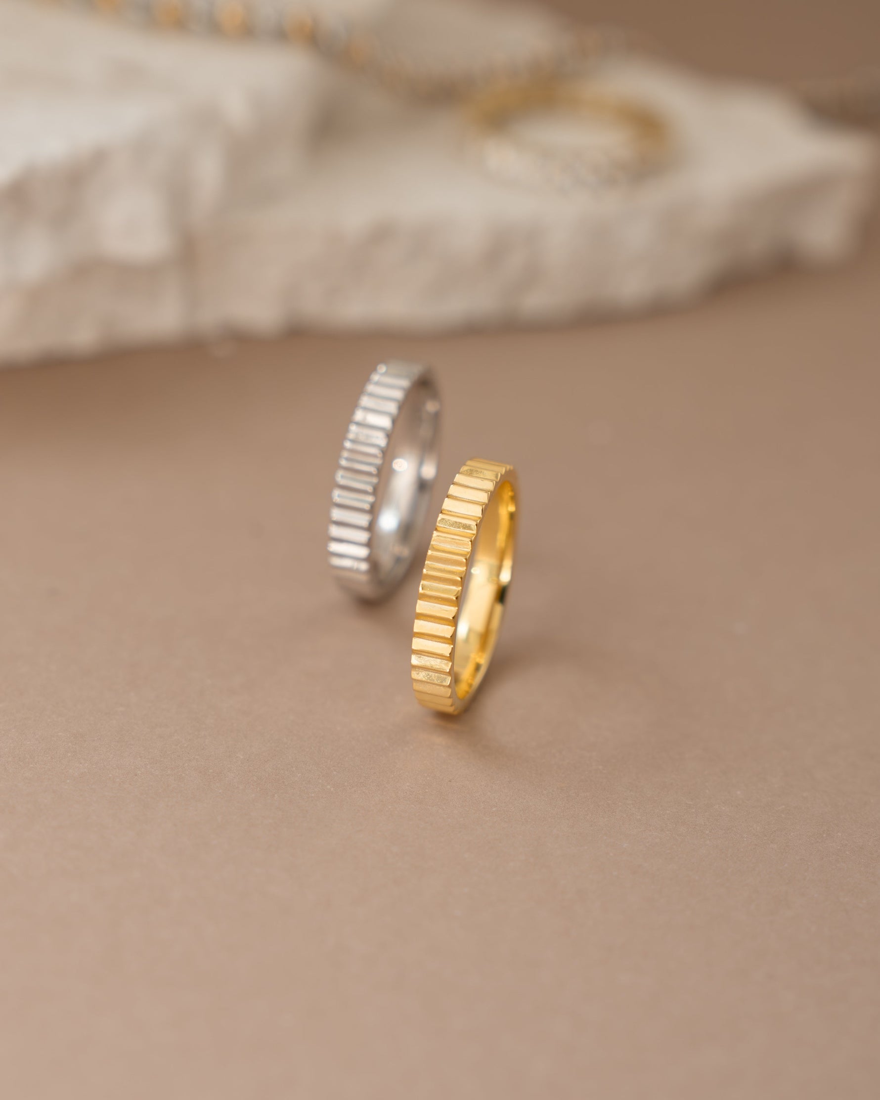 Gold and sterling silver ridged ring by Sami Jewels with textured, grooved design for a stylish, modern look.